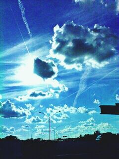 blue, sky, cloud - sky, silhouette, technology, fuel and power generation, cloud, landscape, electricity, low angle view, electricity pylon, beauty in nature, nature, scenics, sunlight, power line, tranquility, tranquil scene, no people, outdoors