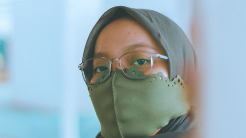 Close-up portrait of young women wearing eyeglasses