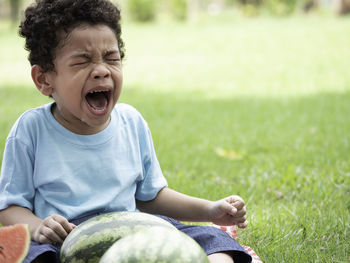 Portrait of little boy with sad expressions, screaming and crying