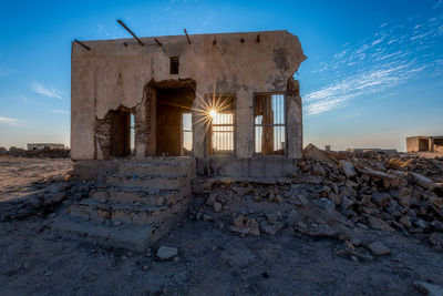 Old ruins of building against sky