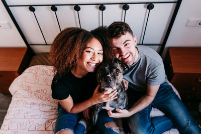 Portrait of smiling woman with dog