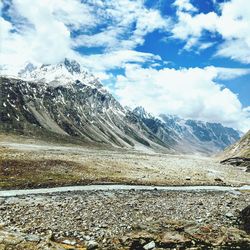 Scenic view of snowcapped mountains against sky