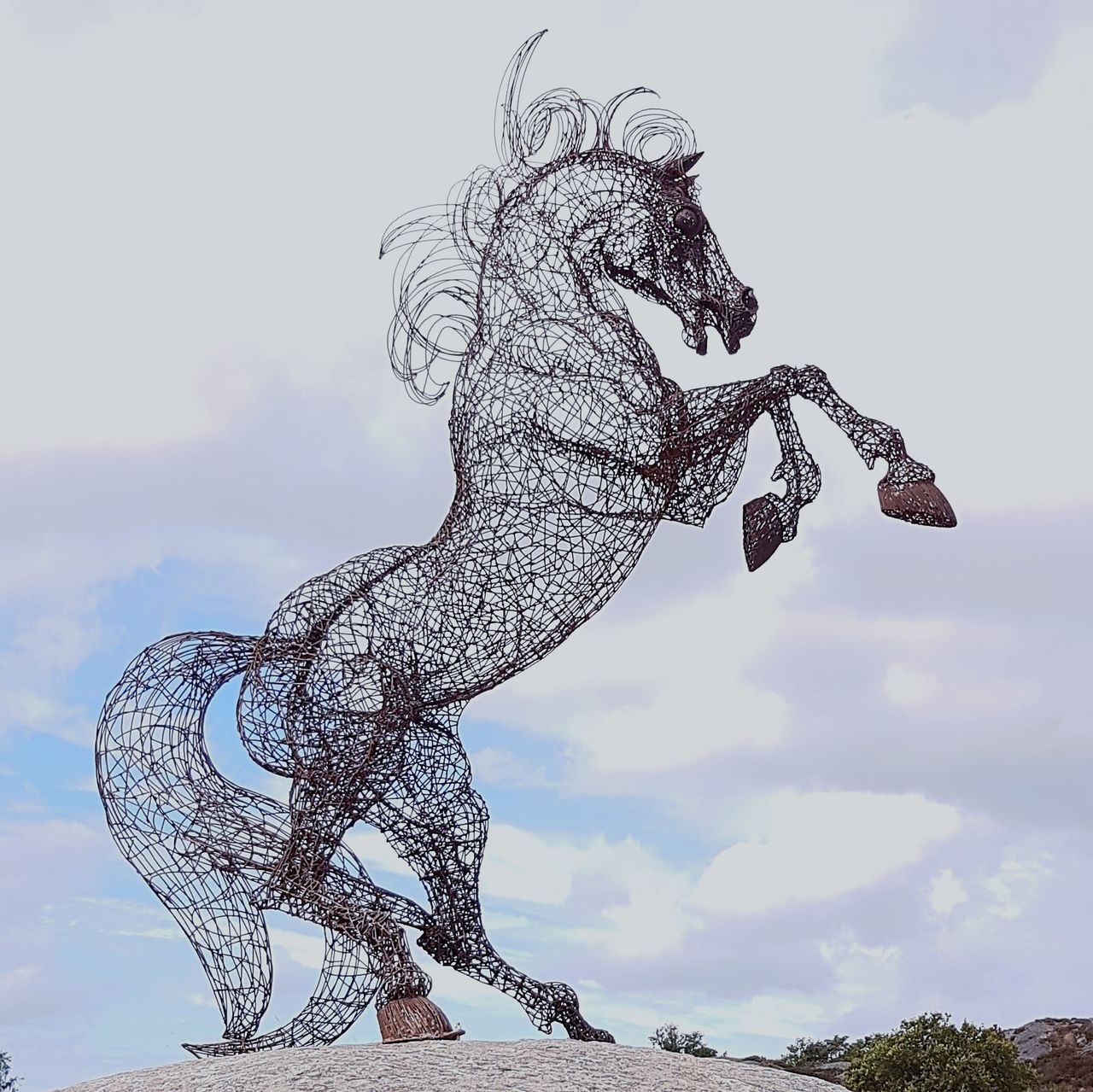 sculpture, animal representation, art and craft, statue, low angle view, sky, cloud - sky, no people, day, outdoors, dragon