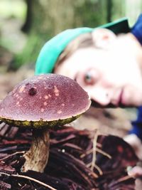 Close-up of mushroom growing on field
