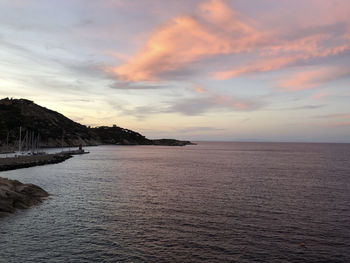 Scenic view of sea against sky during sunset