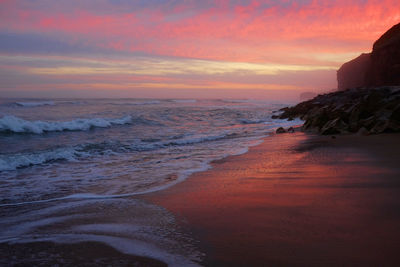 Scenic view of sea against sky during sunset