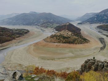 High angle view of road amidst mountains against sky