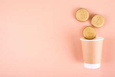 High angle view of coins on table