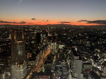 High angle view of illuminated tokyo city buildings at night 