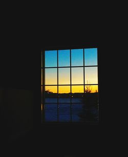 Sunset seen through window