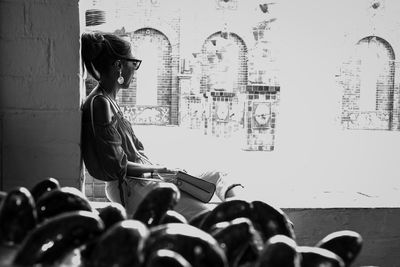 Women standing on wall