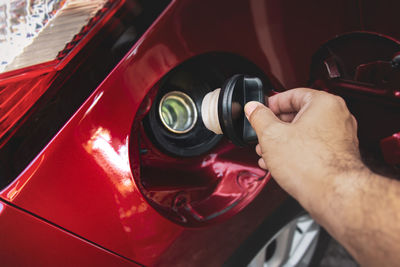 High angle view of man photographing car