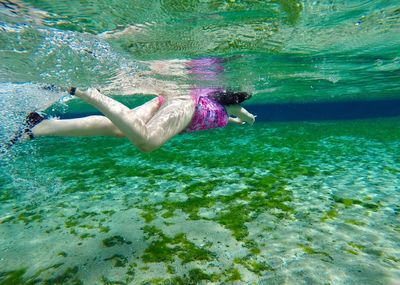 Man swimming in sea