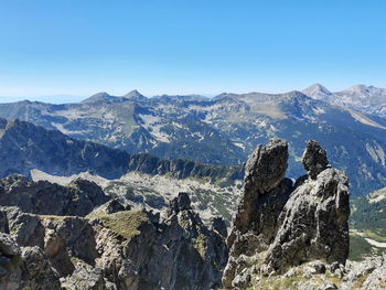 Scenic view of mountains against clear sky