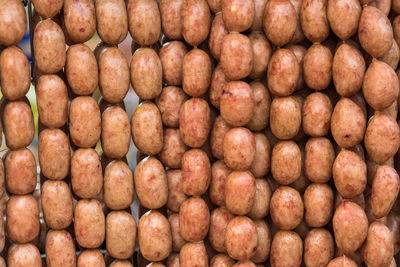 Full frame shot of onions for sale at market stall