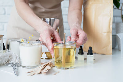 Midsection of woman preparing food