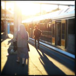 Full length of woman walking in city