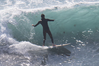 Man swimming in sea