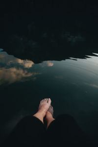 Personal perspective of human feet in water