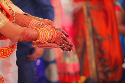 Close-up of a hand holding blurred background