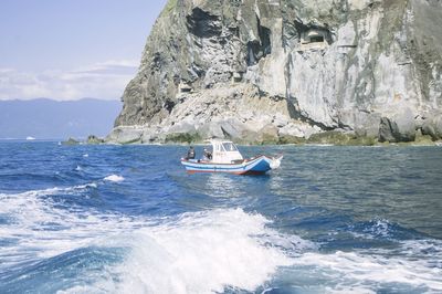 Boat sailing in sea