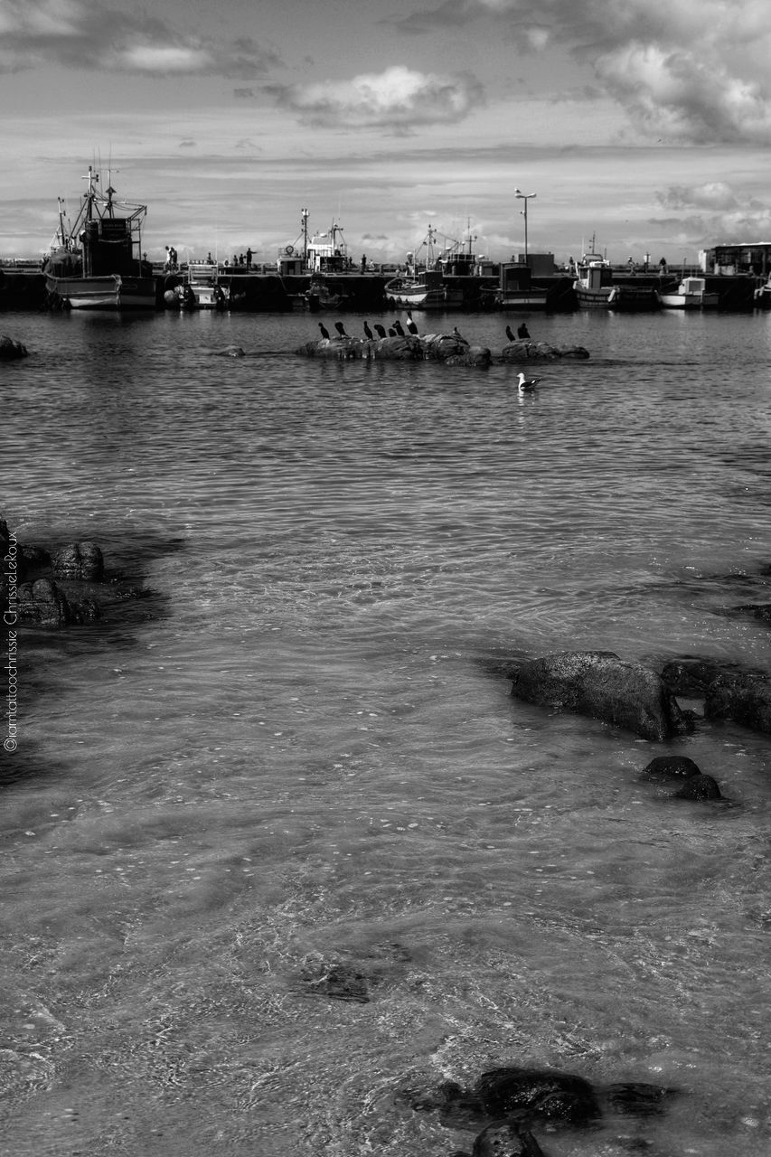 water, nautical vessel, cloud - sky, transportation, sea, sky, nature, mode of transportation, waterfront, day, no people, harbor, built structure, architecture, outdoors, scenics - nature, building exterior, tranquility, tranquil scene