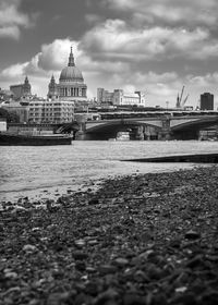 River by city against sky