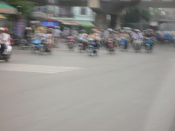 Crowd on illuminated city street