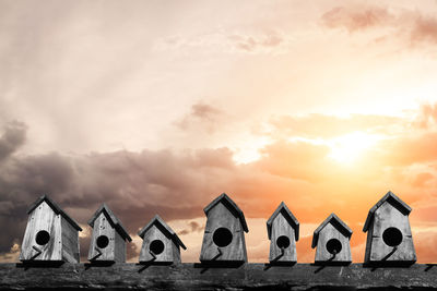 Panoramic view of building against sky during sunset