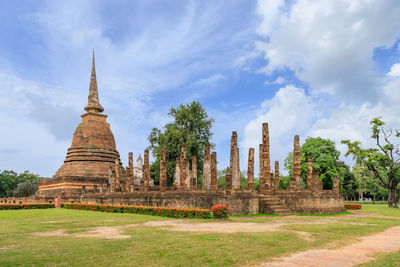 View of temple against cloudy sky