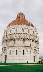 Facade of temple building against sky