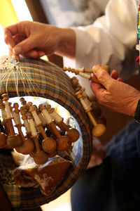 Midsection of man holding craft product