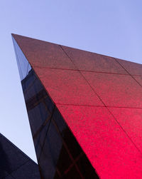 Low angle view of modern building against clear sky