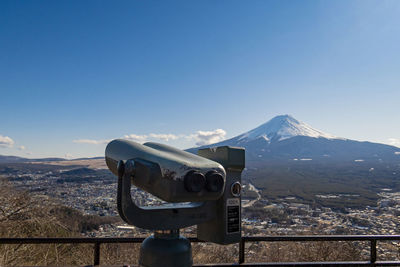 Scenic view of mountain against clear blue sky