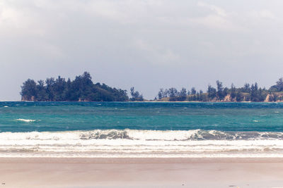 Scenic view of beach against sky