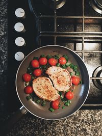 Directly above shot of meat cooking in pan