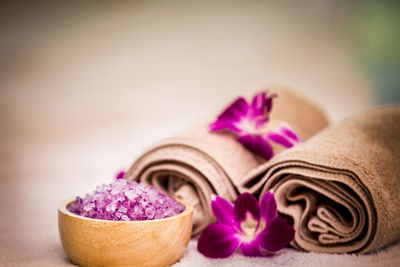 Close-up of purple flowers on table