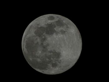 Close-up of moon against clear sky at night