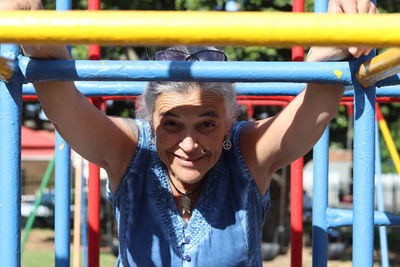 Portrait of young woman in playground