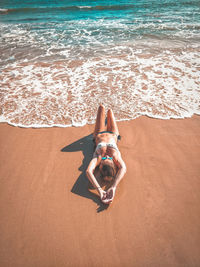 High angle view of woman on beach