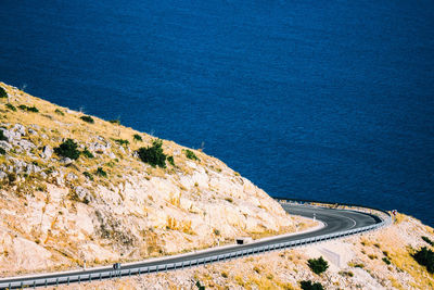 Curve of a spectacular coast street on an croatian island