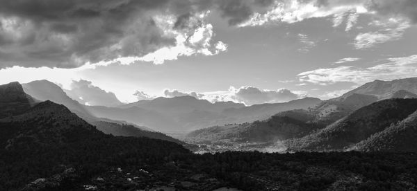 Panoramic view of mountains against sky