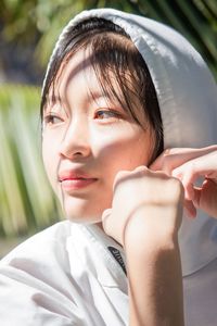 Close-up portrait of teenager korean mixed chinese women in the sun light on morning.