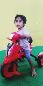 Cute boy with toy car