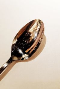 Close-up of bread against white background