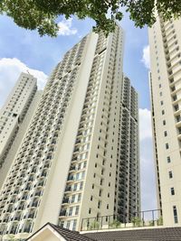 Low angle view of modern buildings against sky