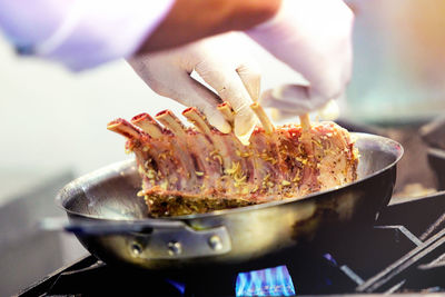 Close-up of person preparing food