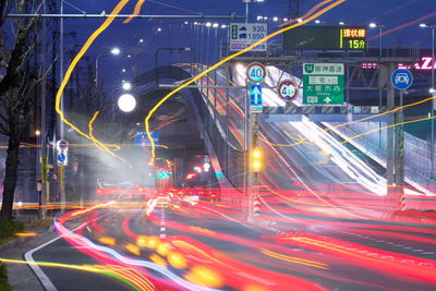 Light trails on city street at night