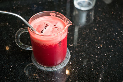 High angle view of drink in glass on table