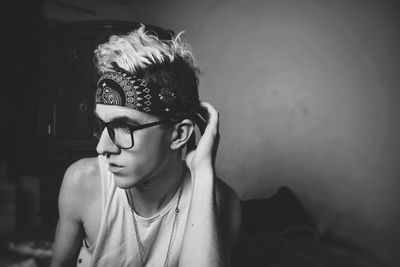 Close-up of young man wearing bandana